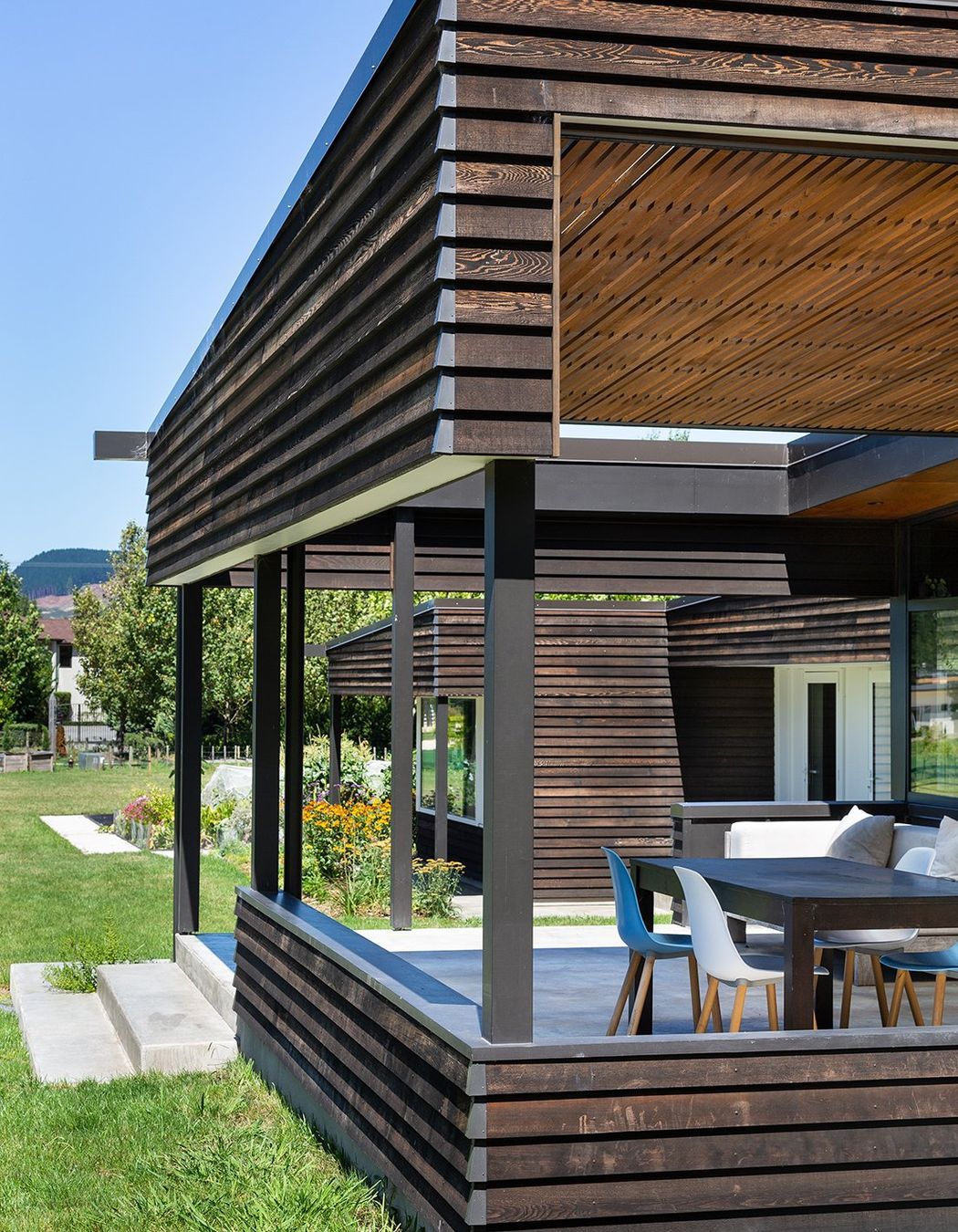  This outdoor space connects the interior and exterior spaces whilst providing shade. 