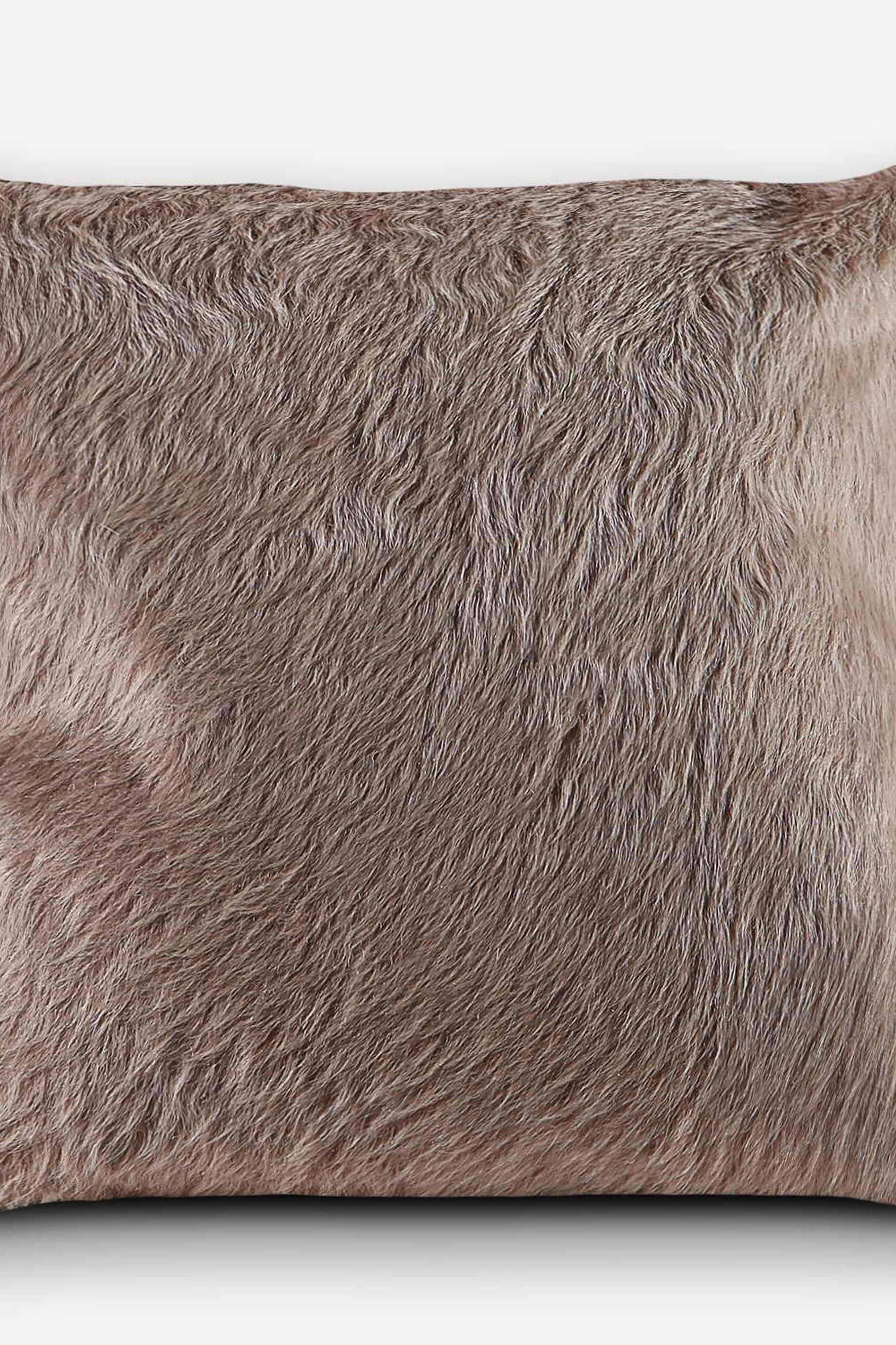 Cowhide single panel cushion in beige and sand by Bage Home