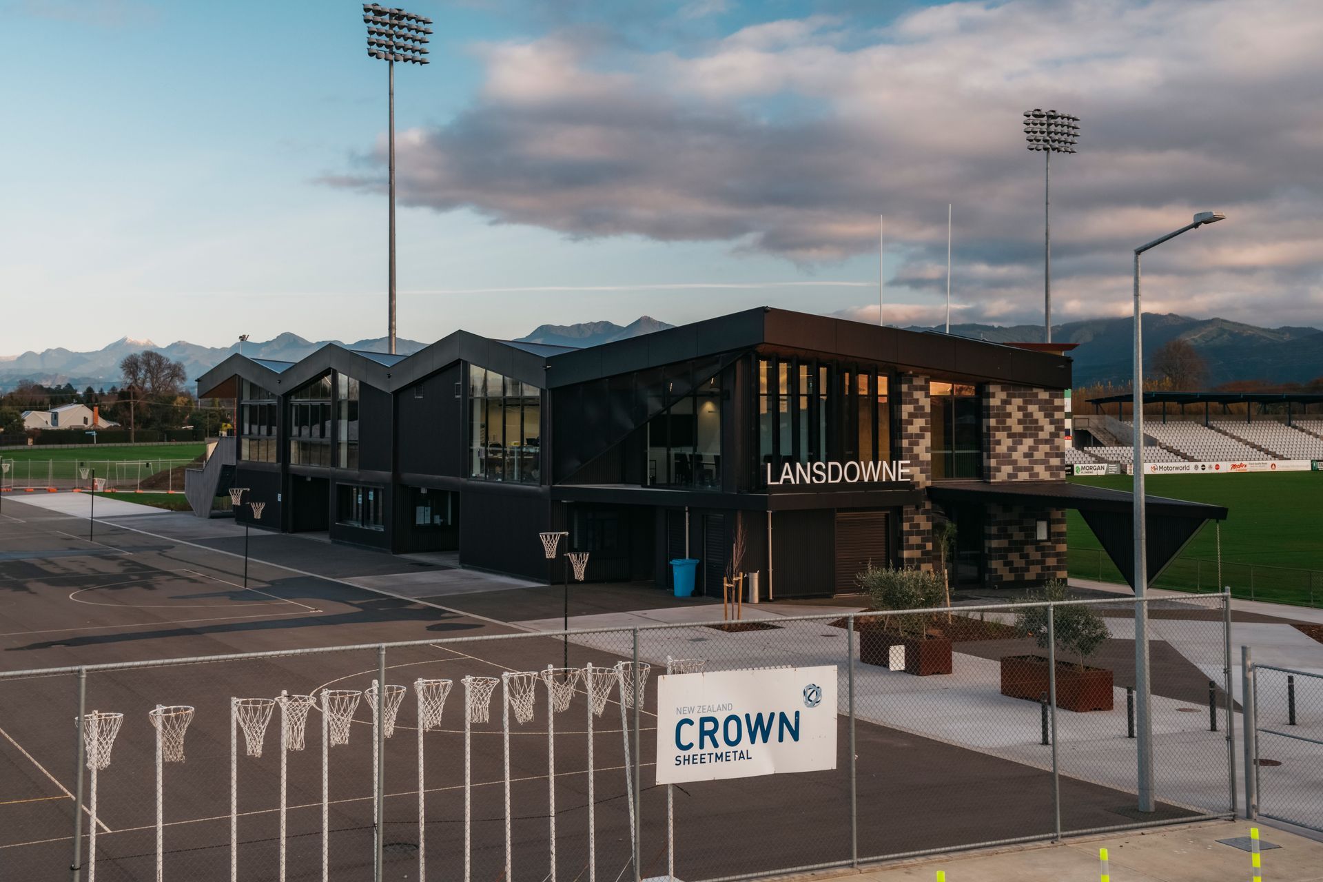 The Richmond Ranges and Wither Hills in the background are reflected in the folded roof form.