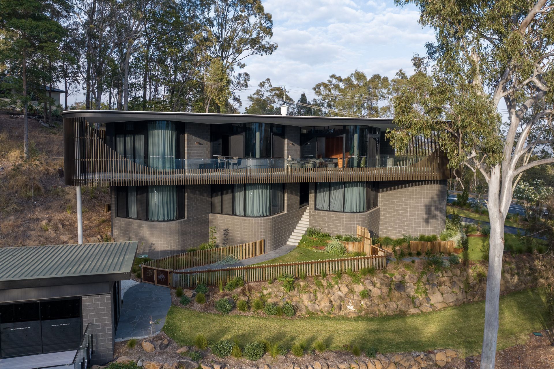 The art studio (on the left) takes in the sculptural view of the home as inspiration.