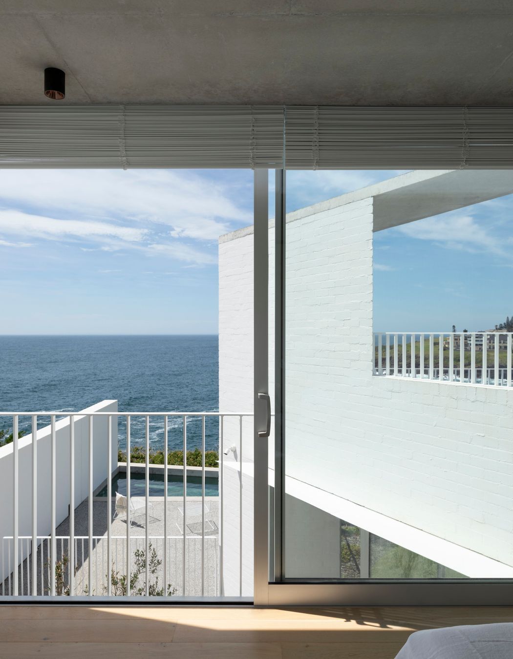 A Juliet balcony in the master bedroom allows air to flow through the upper floor.