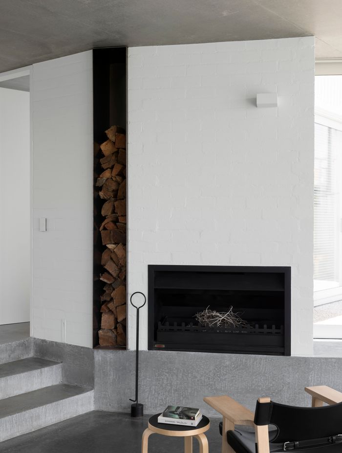 The fireplace in the sunken lounge is a favourite spot to relax.