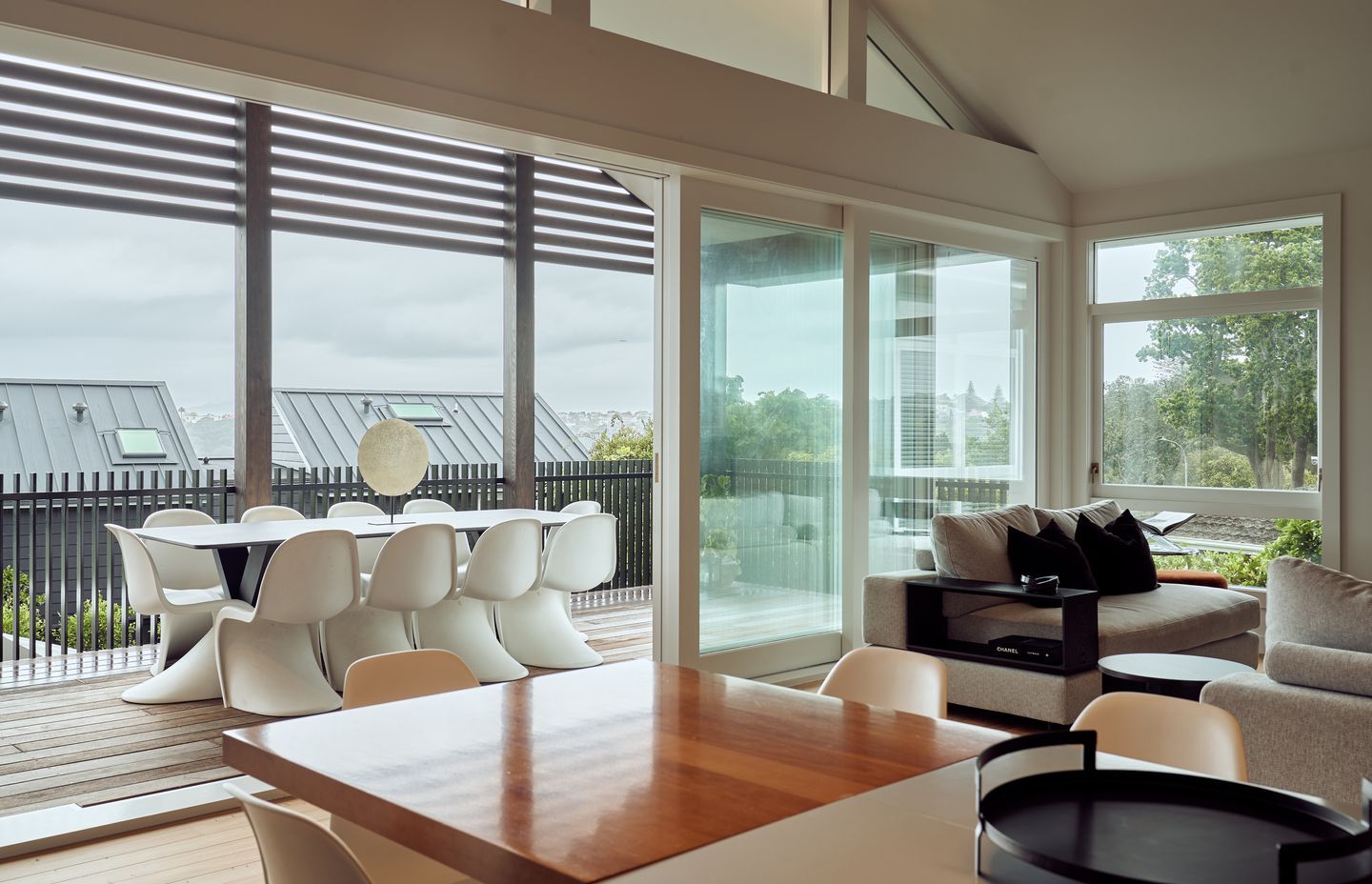 The living and dining now flows out seamlessly to a covered deck.