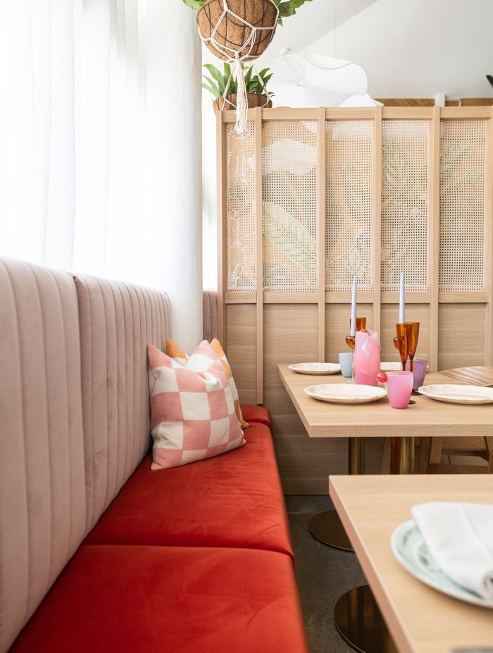 Burnt amber seating adds a touch of drama.