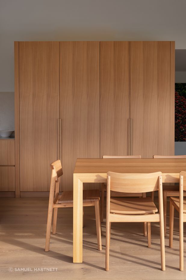 The understated interior finishes help amplify the natural light that floods the space.