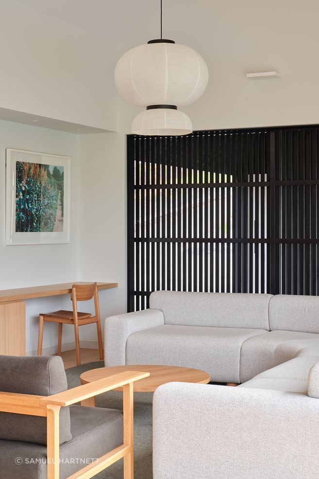 The main living spaces are all accessed along the 'spine' of the home.