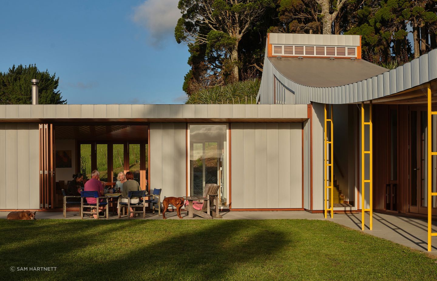 Slightly curved, anodised aluminium cladding panels were designed with this project in mind - pictured right.