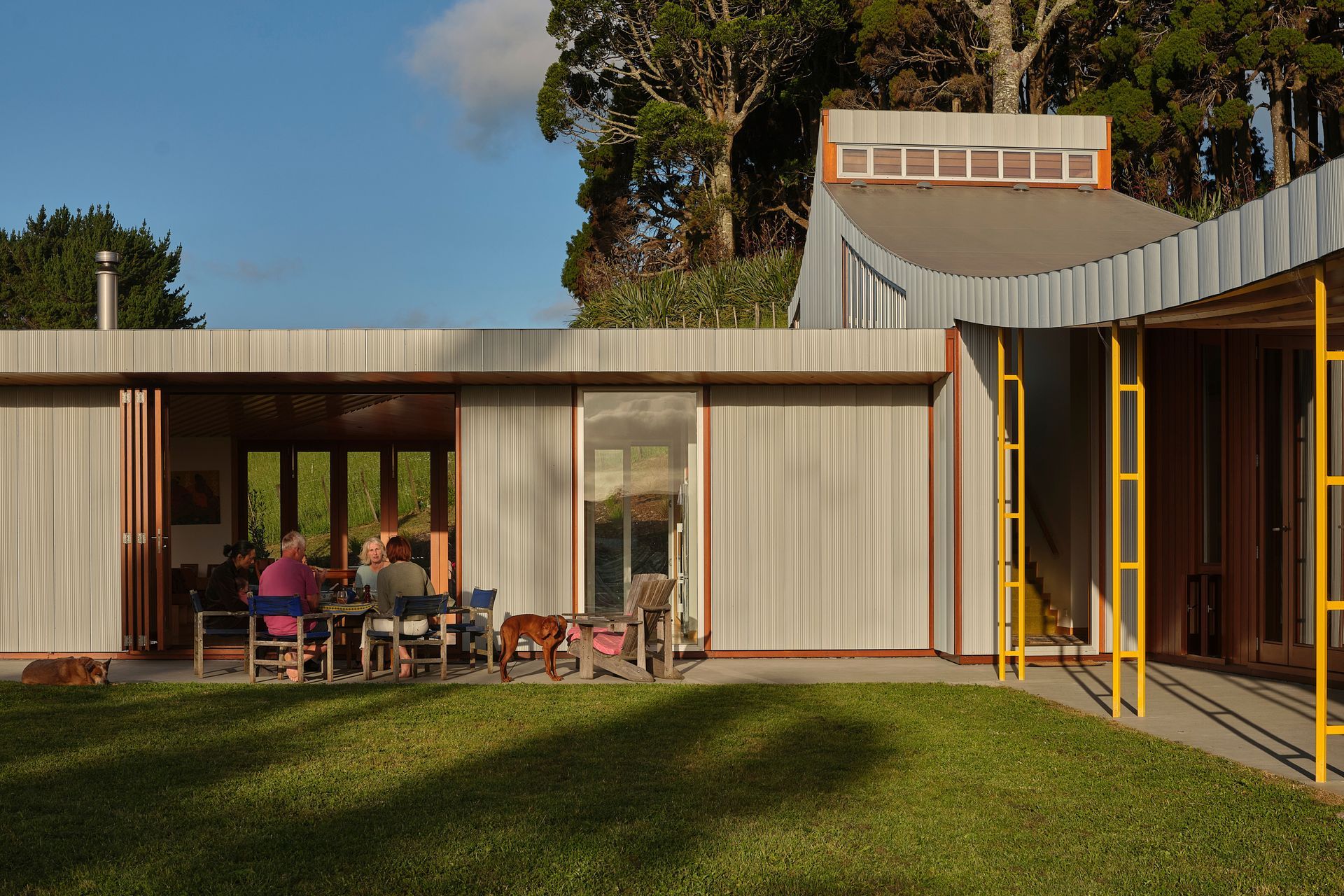 Slightly curved, anodised aluminium cladding panels were designed with this project in mind - pictured right.