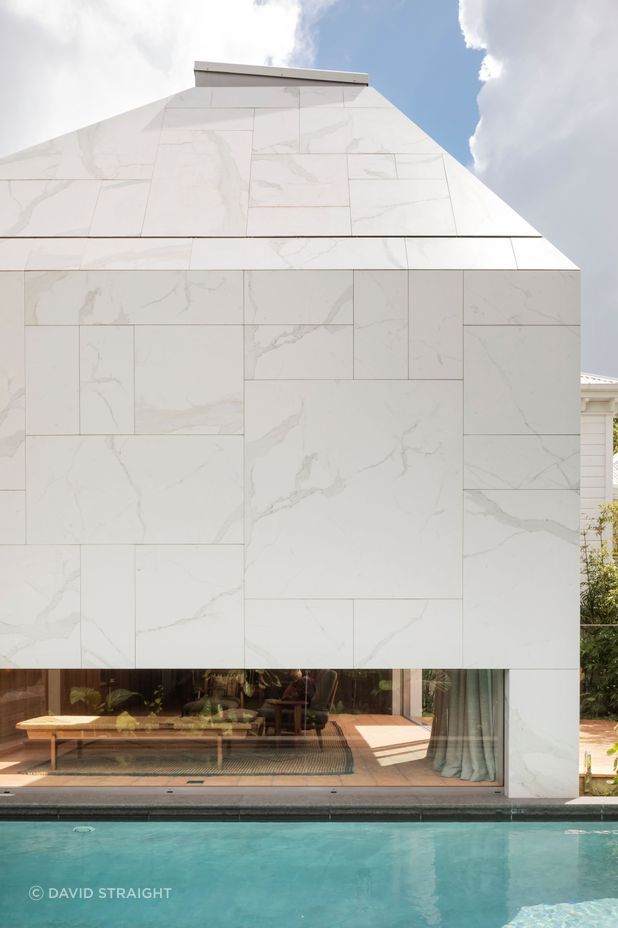 The porcelain tile cladding is a unique choice. “We thought we'd work with all the available off-the-shelf tile formats and mix them up in an interesting pattern. It really relied on having a little bit of adjustment in the installation.”