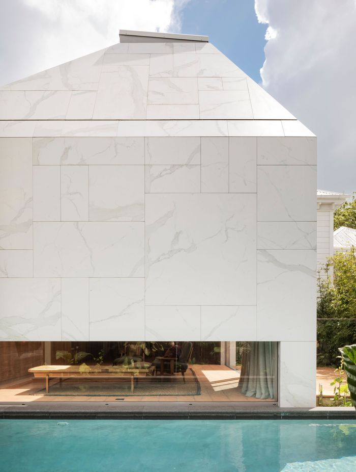 The porcelain tile cladding is a unique choice. “We thought we'd work with all the available off-the-shelf tile formats and mix them up in an interesting pattern. It really relied on having a little bit of adjustment in the installation.”