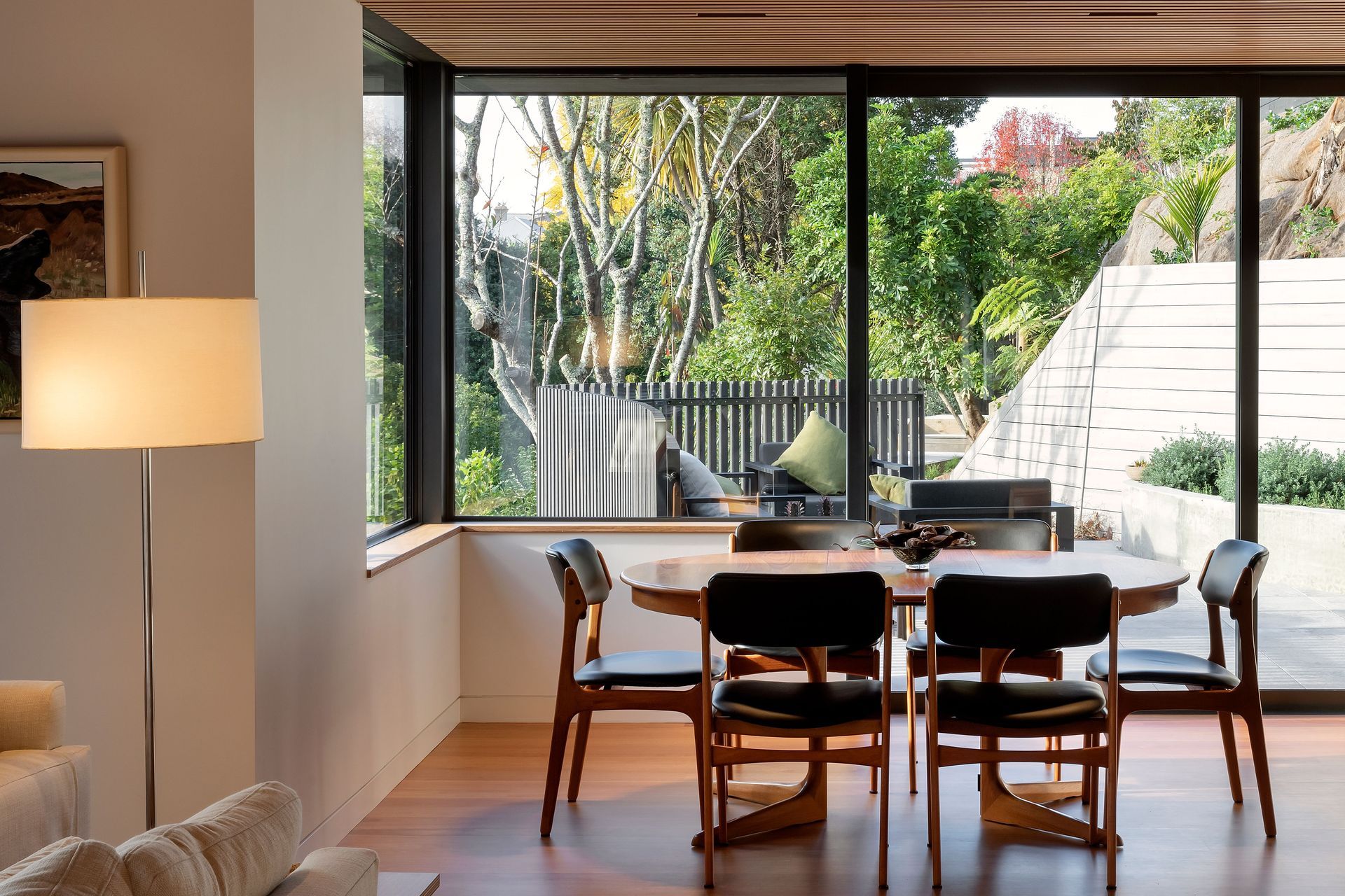 The dining area opens to the morning terrace. Hamish took care to proportion the main living space so it didn’t feel uncomfortably large. “We were wanting to define the various areas really well, and create connections with view lines to the outside.”