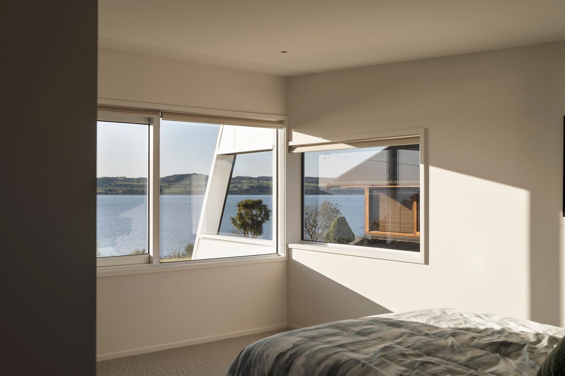 The second bedroom enjoys elevated views over the lake.