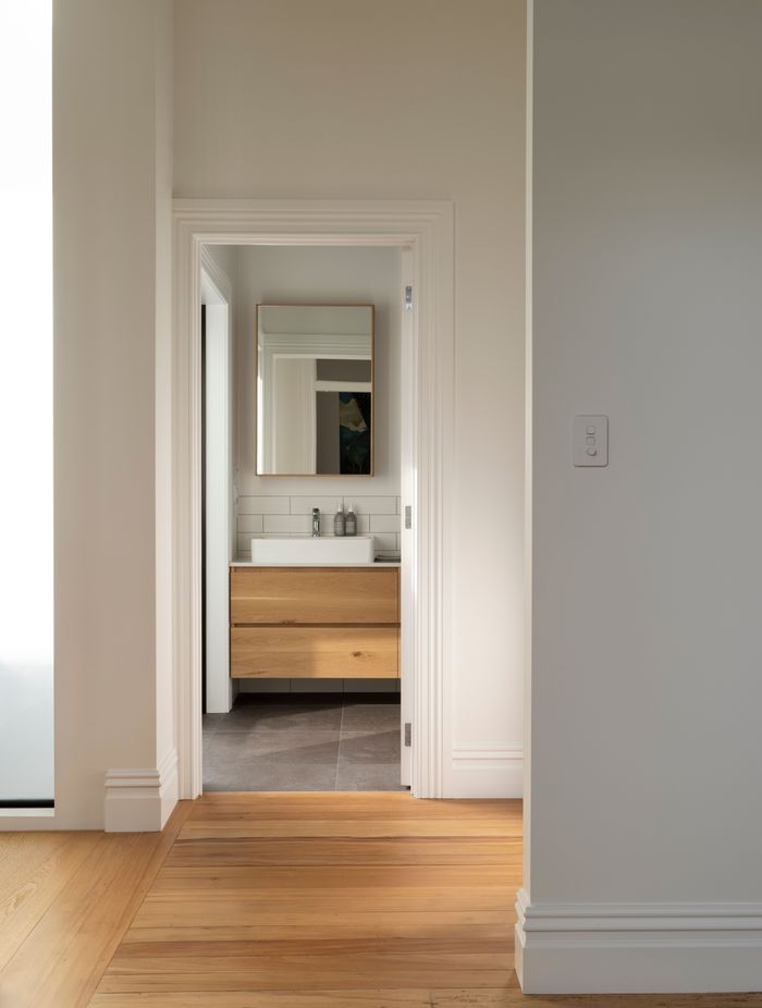 Oak flooring runs throughout the top level.