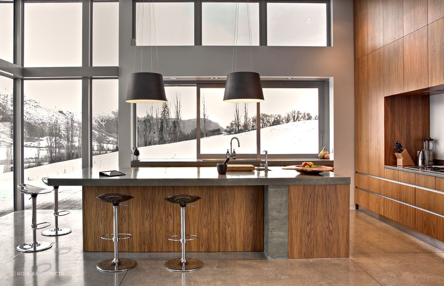 A perfectly balanced use of cedar, stone and concrete feature throughout the home.