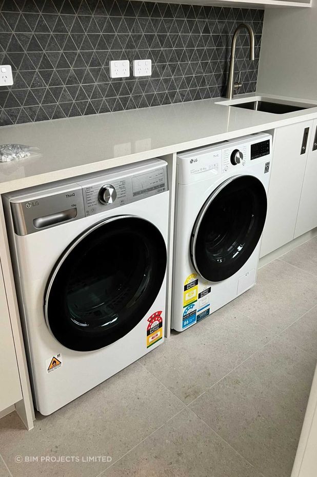 BIM Projects Limited renovated the laundry with a new layout, flooring and cabinetry.