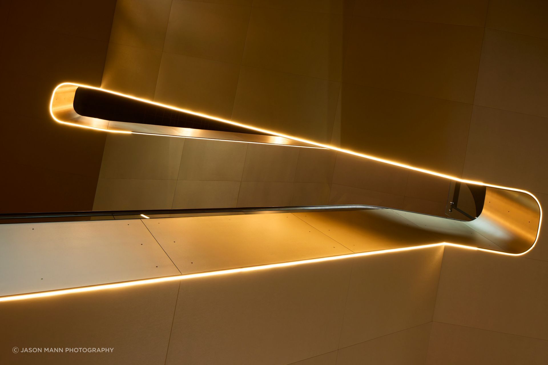 Beneath the escalator: an unforgettable experience of movement and colour.