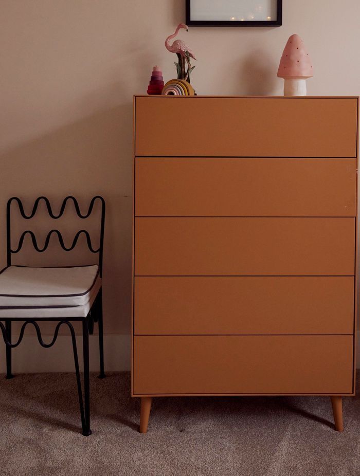 Dusky pink complements the home's soft, neutral colour palette.