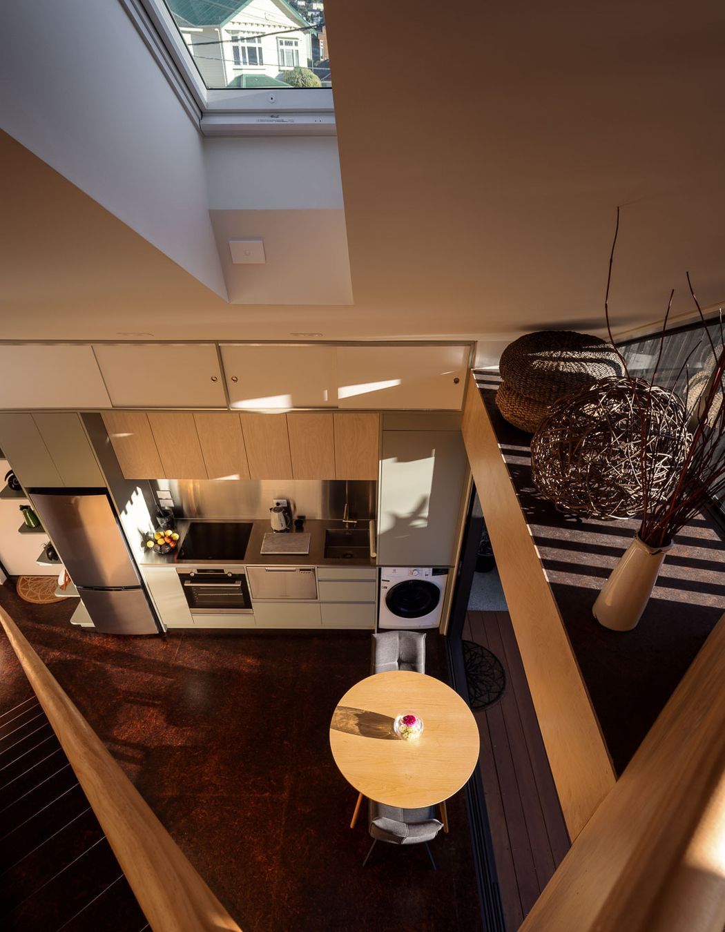 The mezzanine floor is a clever bonus space that allows room for a guest to stay and a spot to use as a study.