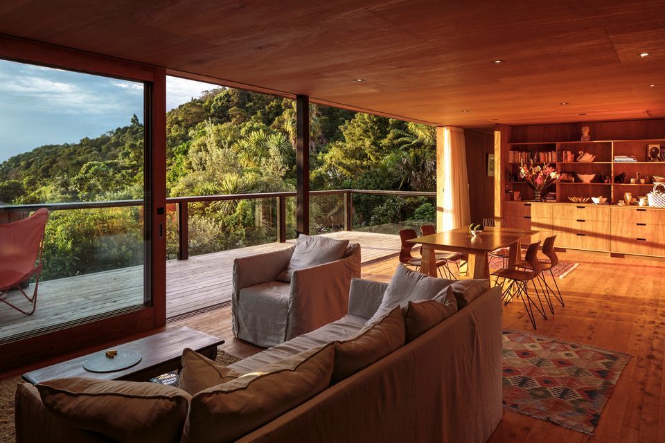 Glazed doors open on to a large deck, allowing generous access to views of the Firth.