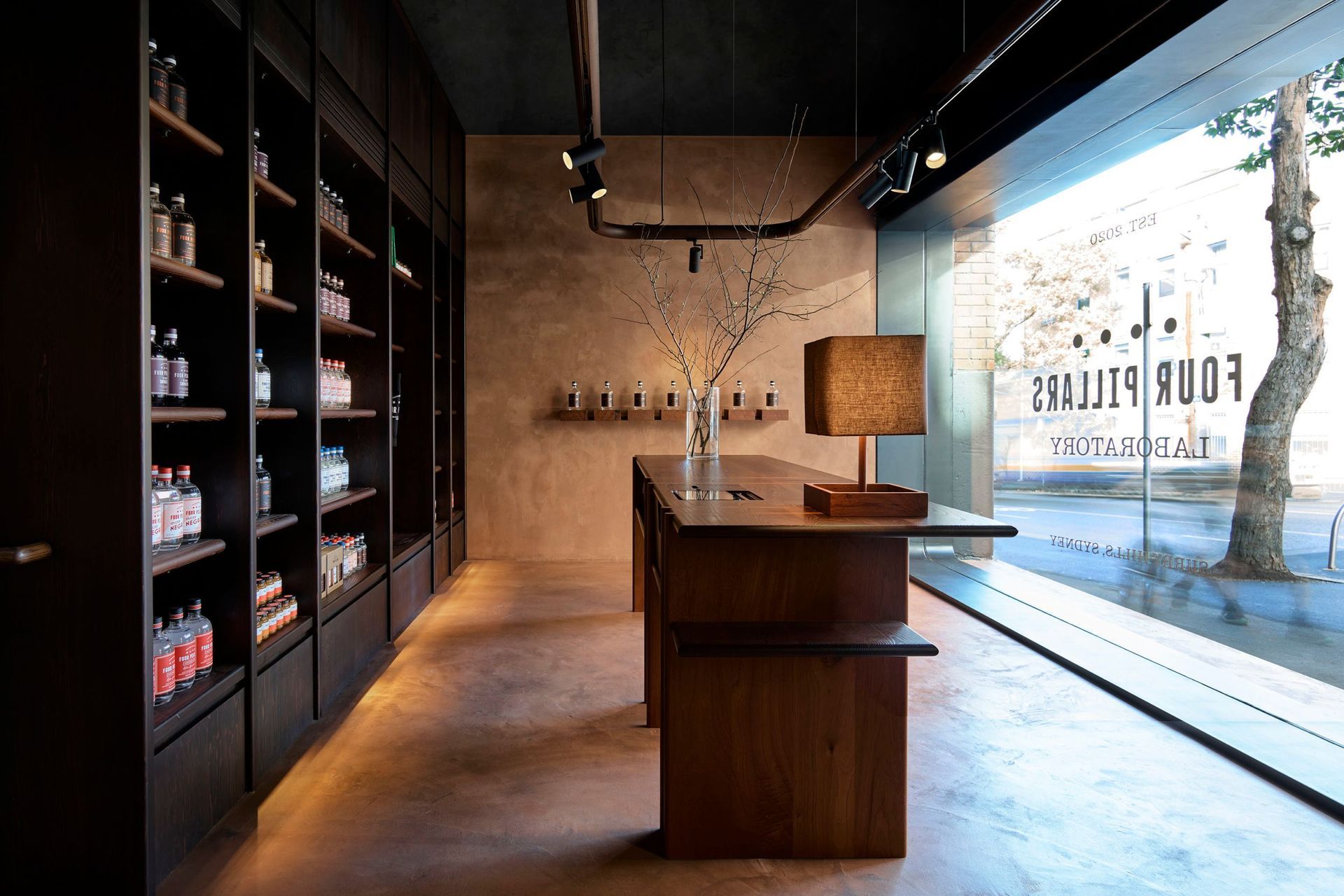 Custom-designed joinery crafted from a blend of Australian hardwoods showcases the Four Pillars' products.