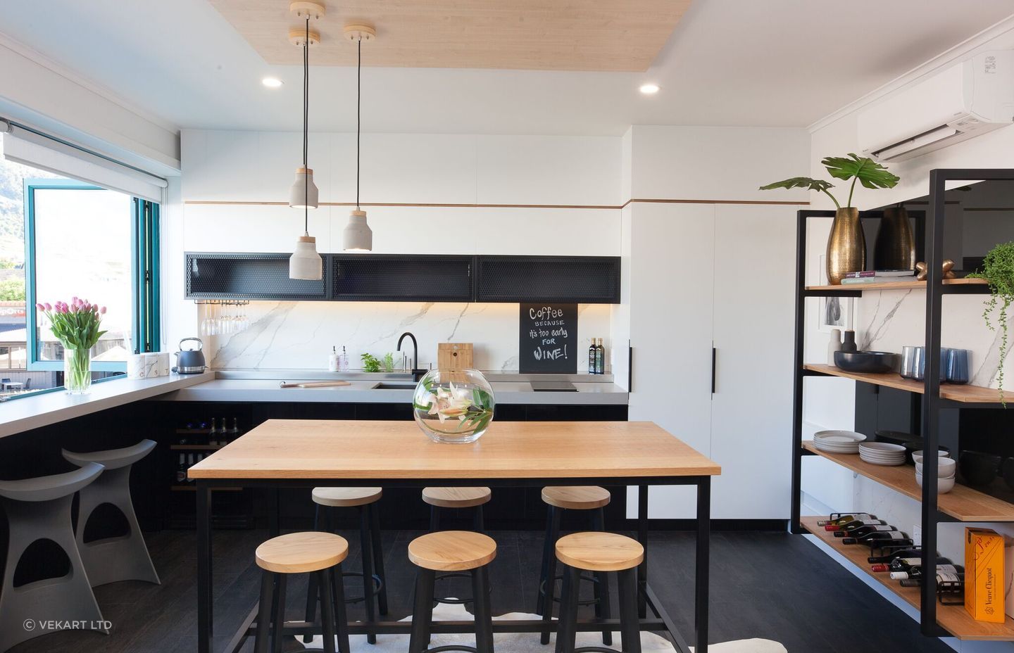 A fun and funky take on the black and white kitchen in Mount Maunganui by Vekart Ltd.