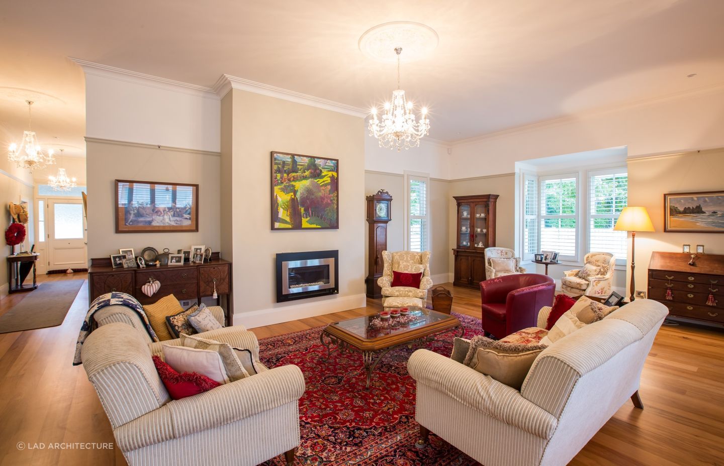 The home's dazzling chandeliers and vintage style furnishings hark to its heritage.