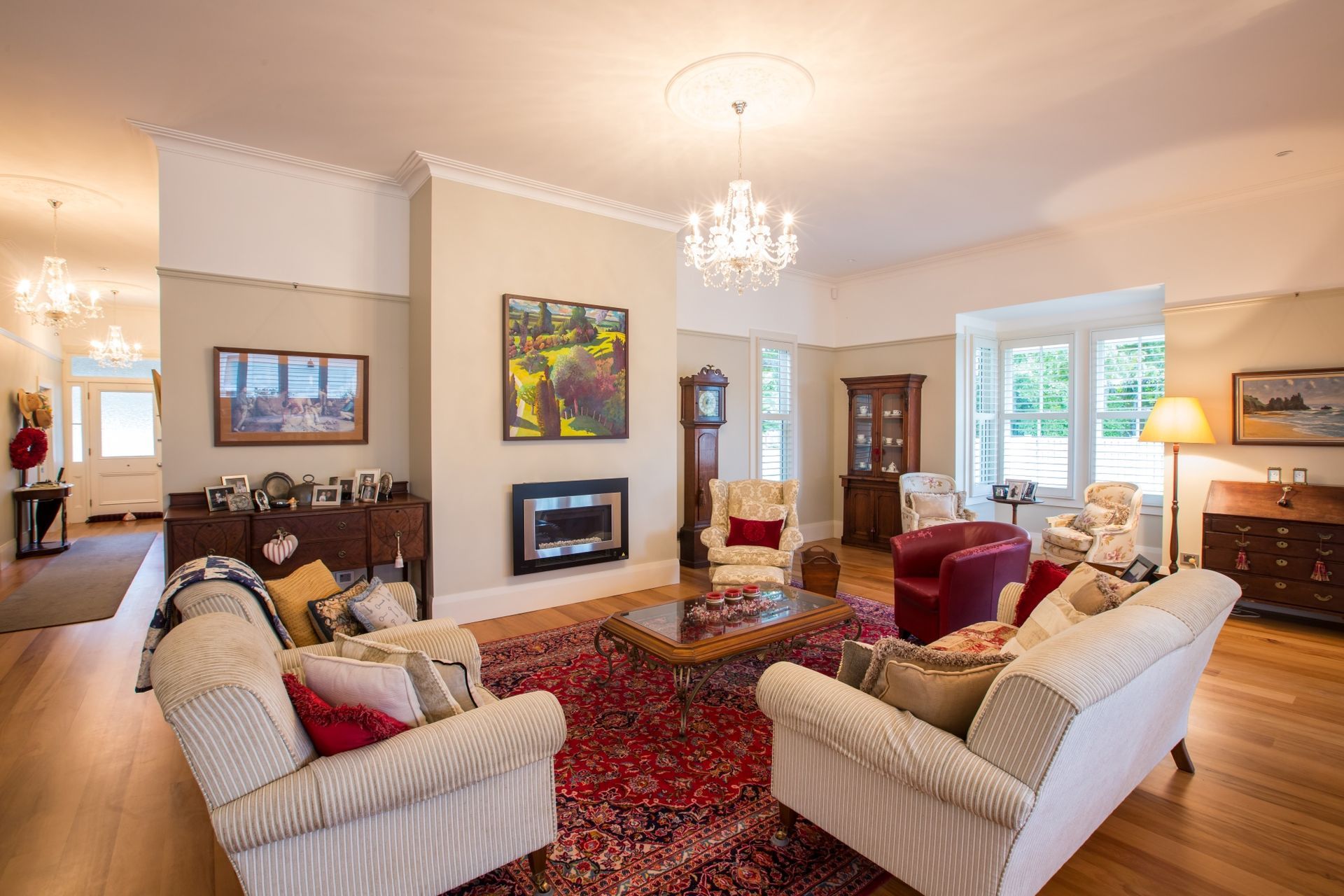 The home's dazzling chandeliers and vintage style furnishings hark to its heritage.