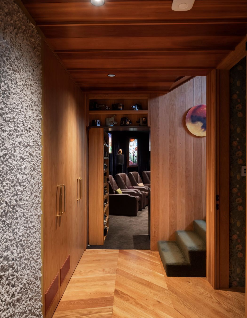 “The movie theatre is a large component of the downstairs area. It’s through a hidden bookshelf door. That was a really fun process,” says Brad. All the theatre fittings came from the Green family’s previous home.