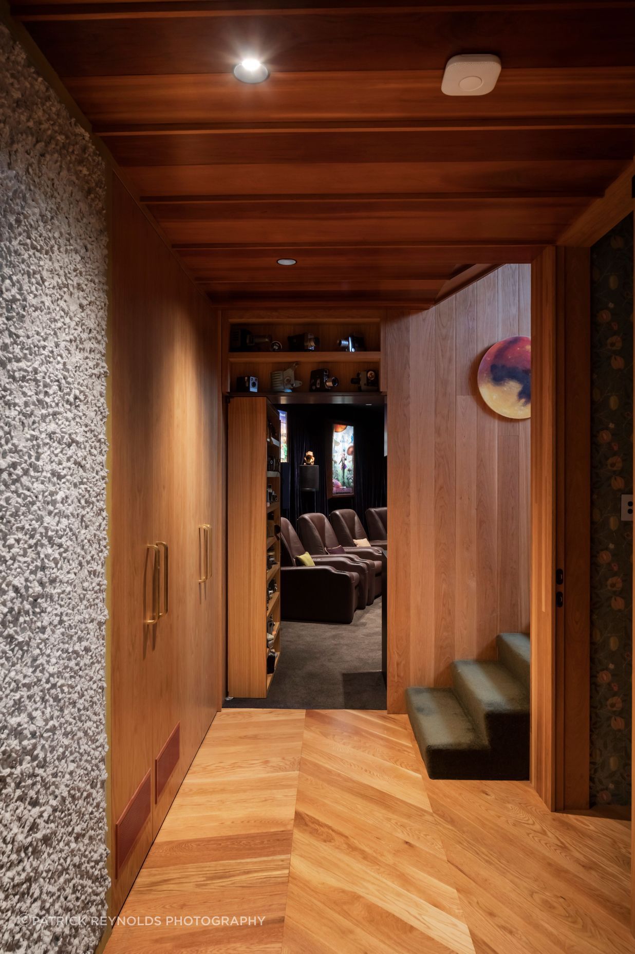 “The movie theatre is a large component of the downstairs area. It’s through a hidden bookshelf door. That was a really fun process,” says Brad. All the theatre fittings came from the Green family’s previous home.