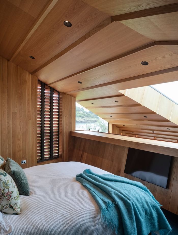 The home has three bedrooms and three and a half bathrooms. Because each bedroom has an en suite the family hadn't decided whose room was whose through the process. “The one on the mezzanine above the kitchen is now the main bedroom,” says Brad.