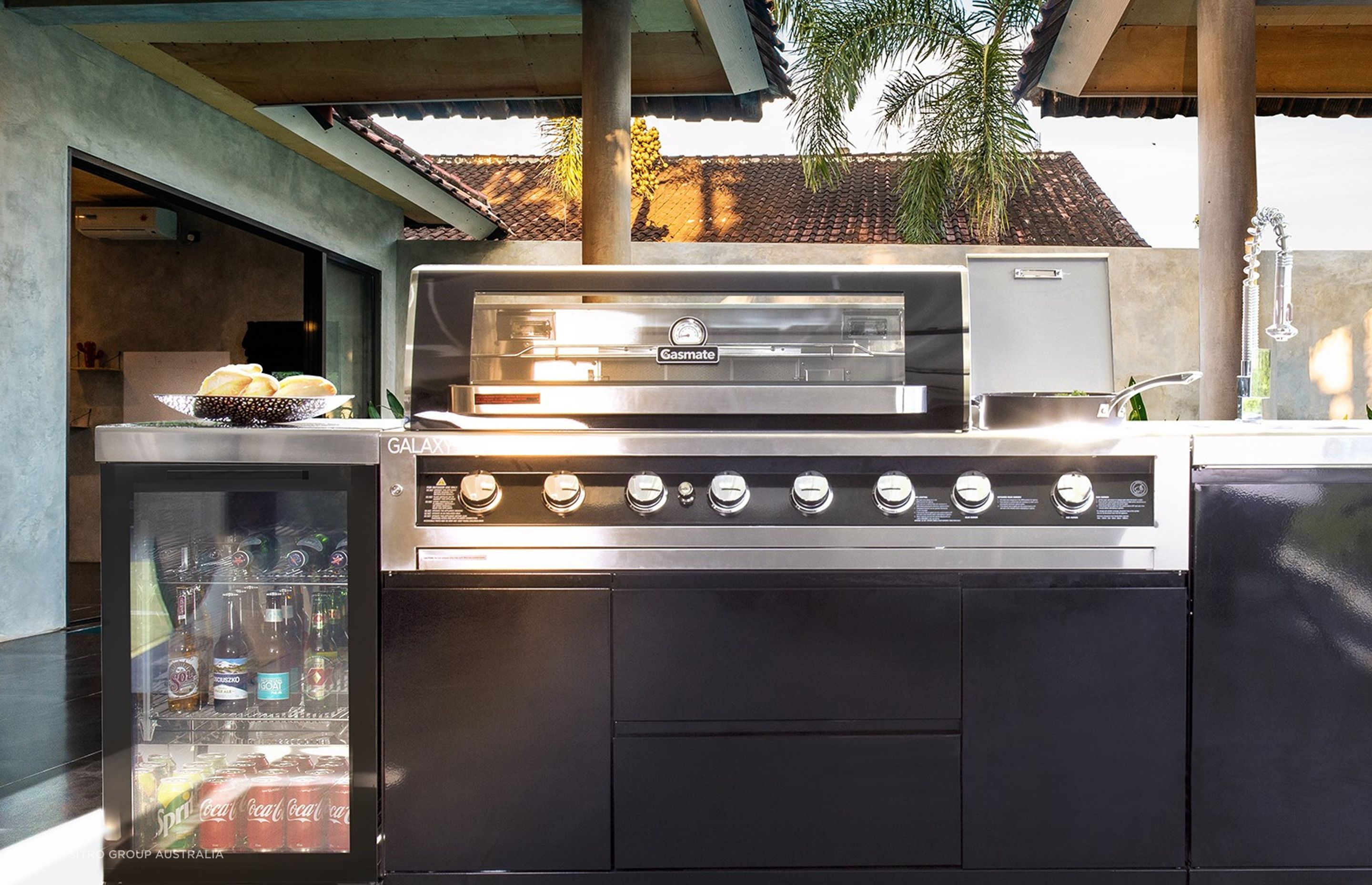 An outdoor fridge like the one featured with the Gasmate Galaxy Black Outdoor Kitchen Package well help keep your drinks chilled on a hot summer's day