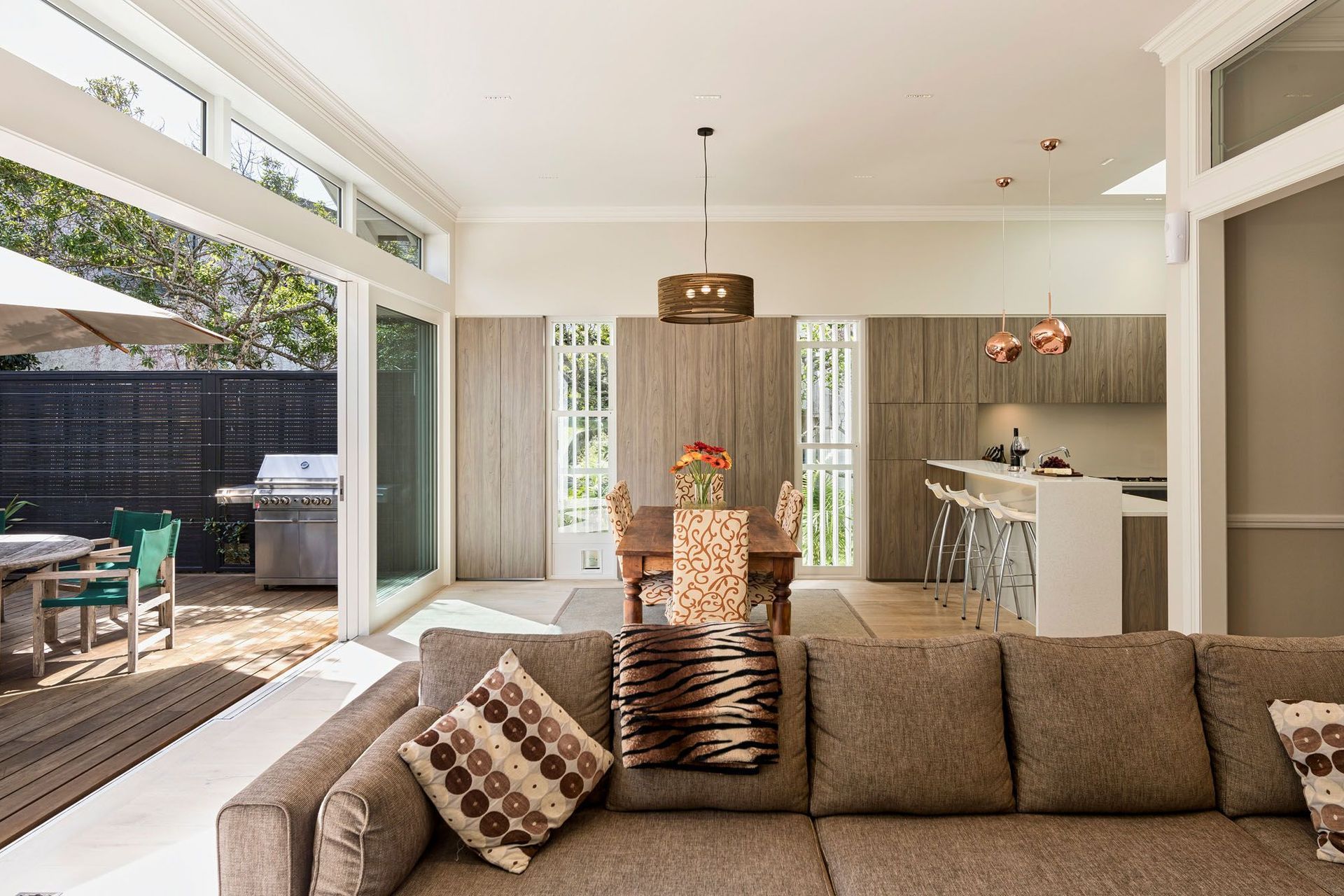 Spacious open plan kitchen and living areas that extend into the outdoor living space.