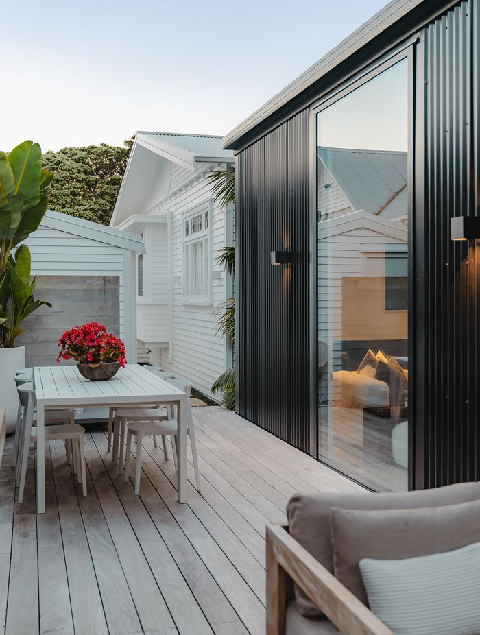 There is a pleasant synchronicity between the original character bungalow and the sharp, contemporary extension.