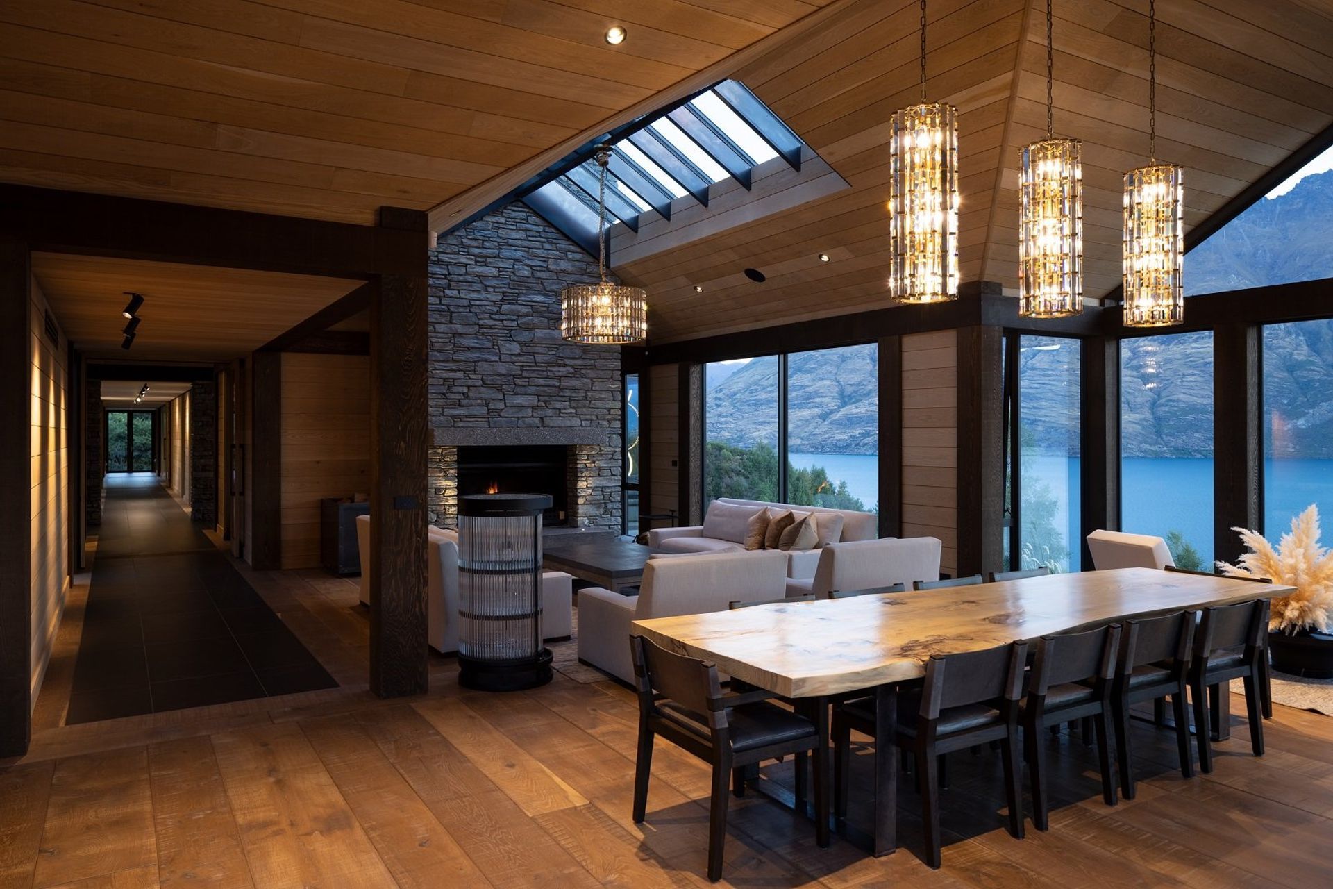 The soaring gable ceilings of the living dining space offer a sense of grandeur.