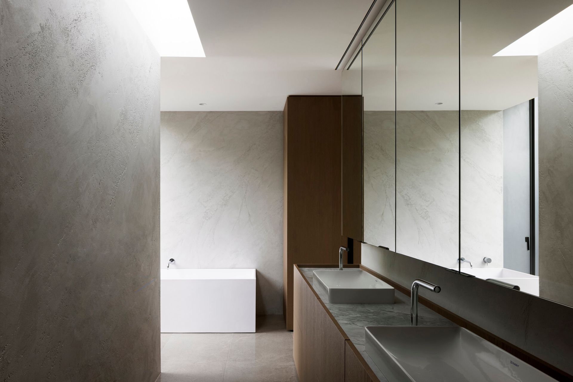 "The house has employed a limited palette of materials, but each is carefully considered for its quality and cohesiveness," Jonathan shares.