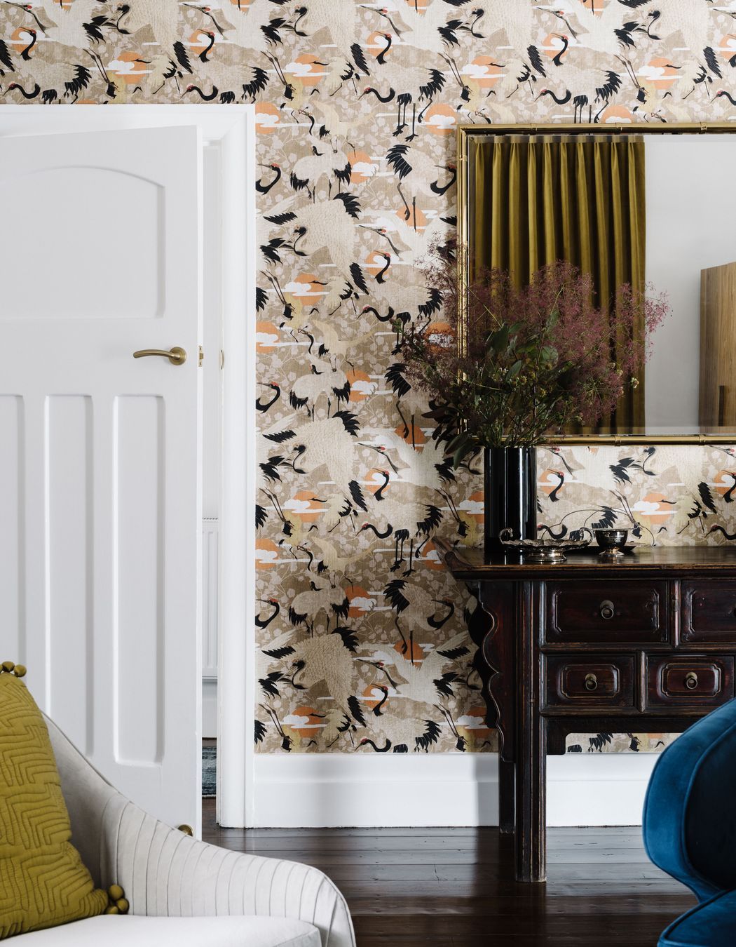 The library’s eye-catching crane wallpaper is an
ode to Andrew’s love of China.