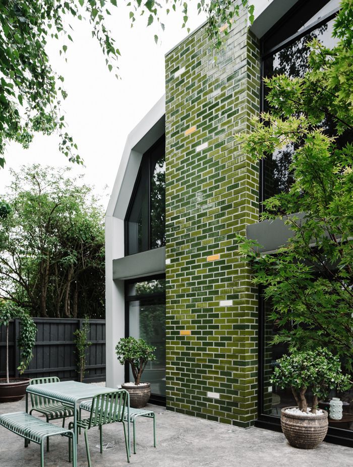 The glazed handmade brick tiles channel the Australian bush.
