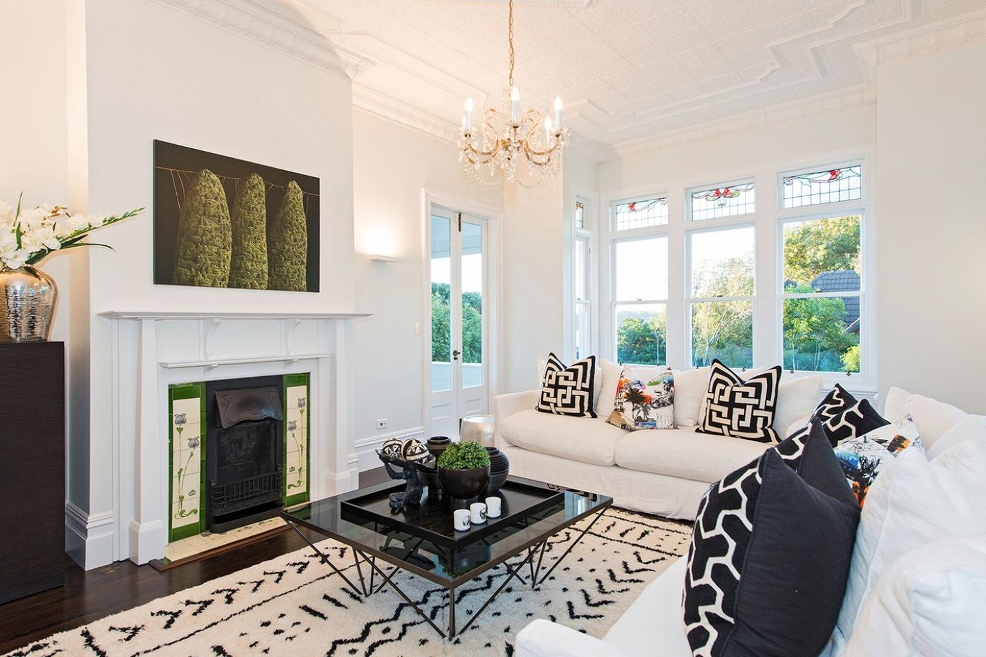 Traditional elements, like the fireplaces and metal ceilings, were retained to preserve its character and heritage.