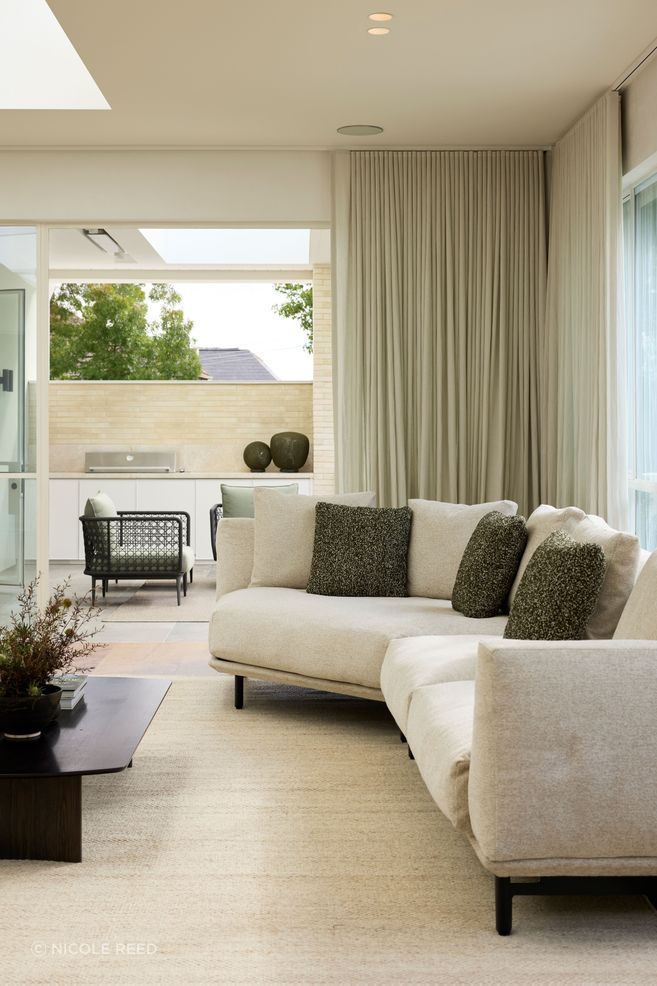 Outdoors, the Aireys woven lounge chairs are featured.