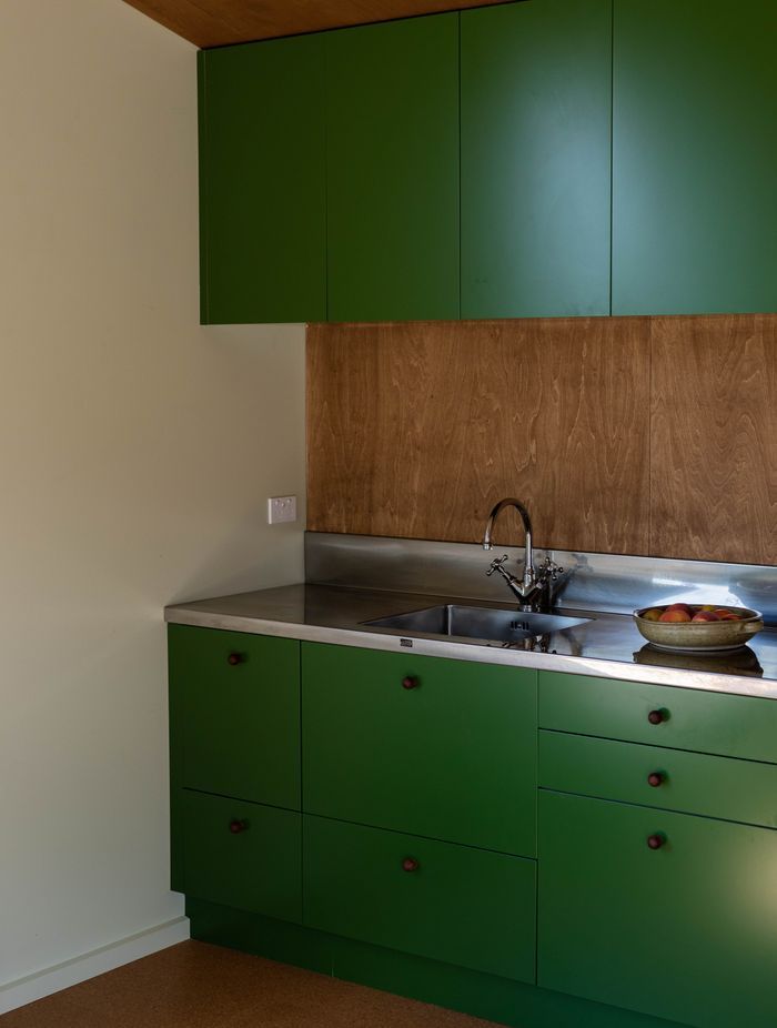 The kitchens are fitted with stainless steel benchtops and mid-century style chrome tapware.