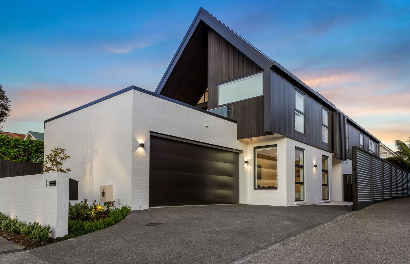 The home's steep gable form is pushed to the absolute limits of what was possible, and allows the spacious floorplan the client desired.