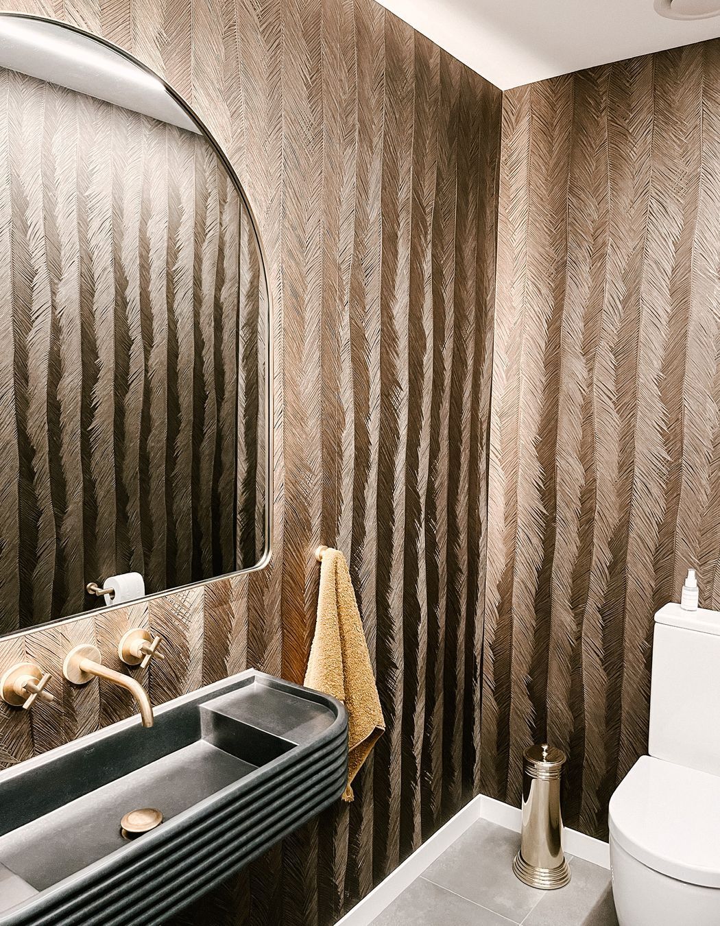 “I feel like it definitely makes a statement but it doesn't feel too overpowering,” says Candice Van Dyk of Mooi Design of this powder room in a Mosgiel house.