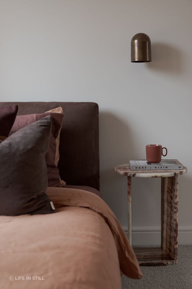 Inspired by the terracotta tiles, a material commonly used in mid-century design, the pair developed a mood board featuring bold accent colours of red, olive, and yellow alongside organic shapes and textures.