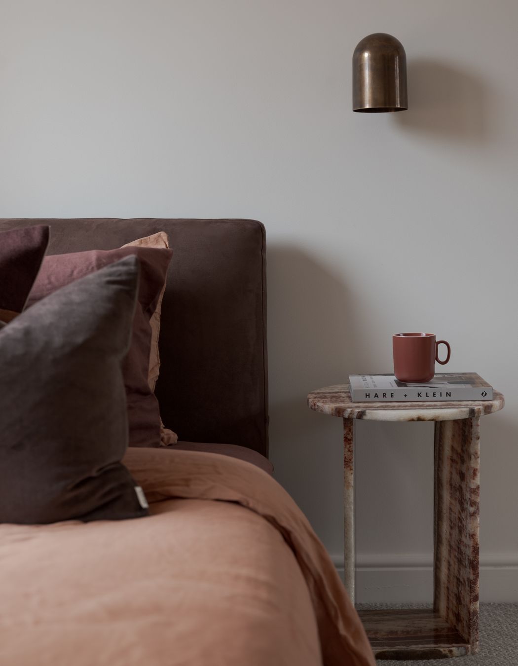 Inspired by the terracotta tiles, a material commonly used in mid-century design, the pair developed a mood board featuring bold accent colours of red, olive, and yellow alongside organic shapes and textures.