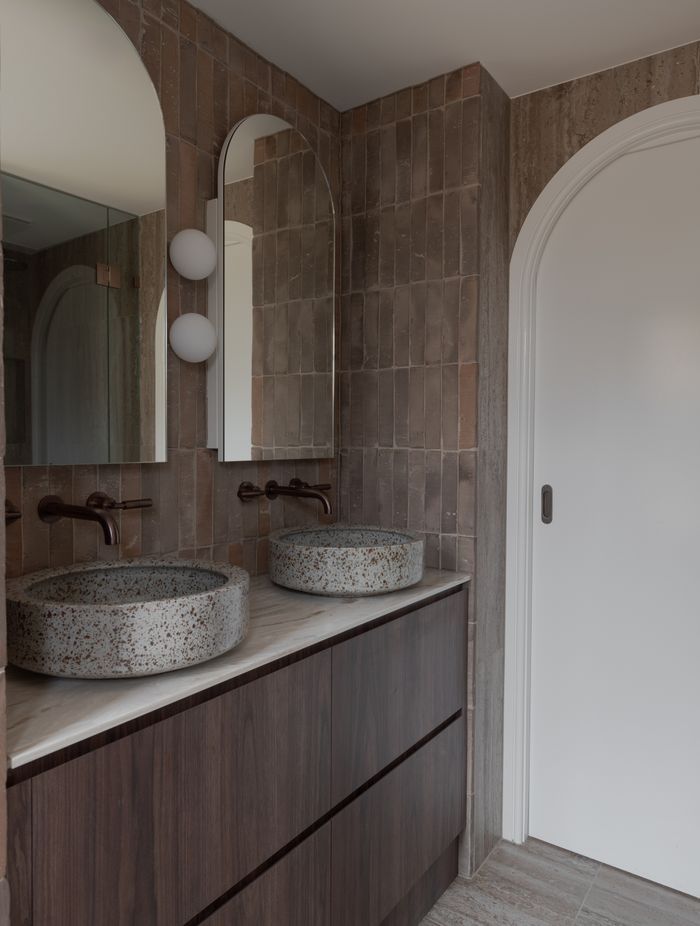 Handmade basins by Lindsey Wherrett Ceramics make handwashing an indulgent experience.