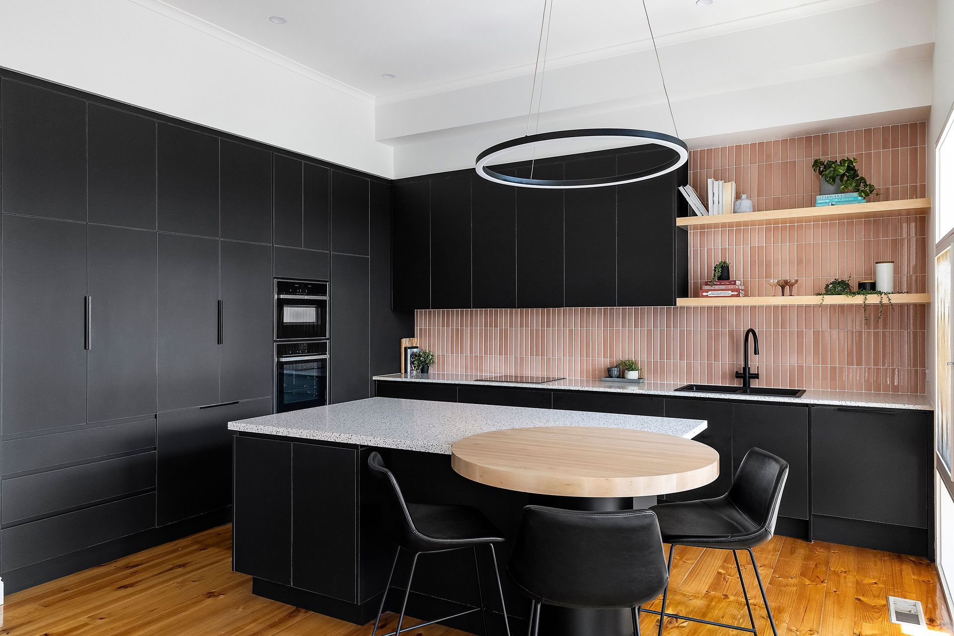 The Rhodes House kitchen in Semaphore, SA shows how shades of black can create a dynamic look with complementary colours and textures