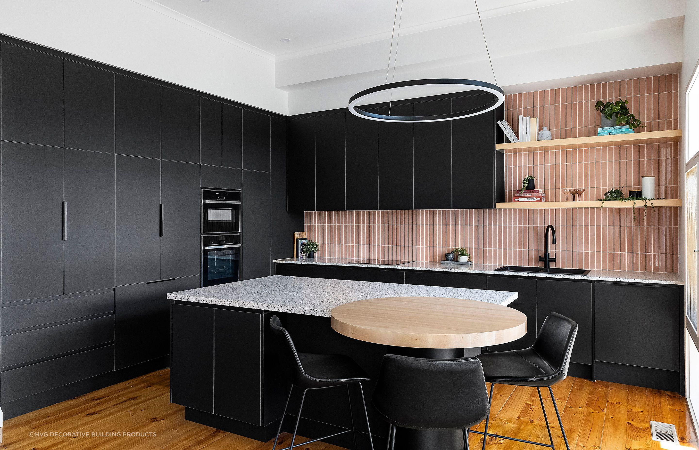 The Rhodes House kitchen in Semaphore, SA shows how shades of black can create a dynamic look with complementary colours and textures