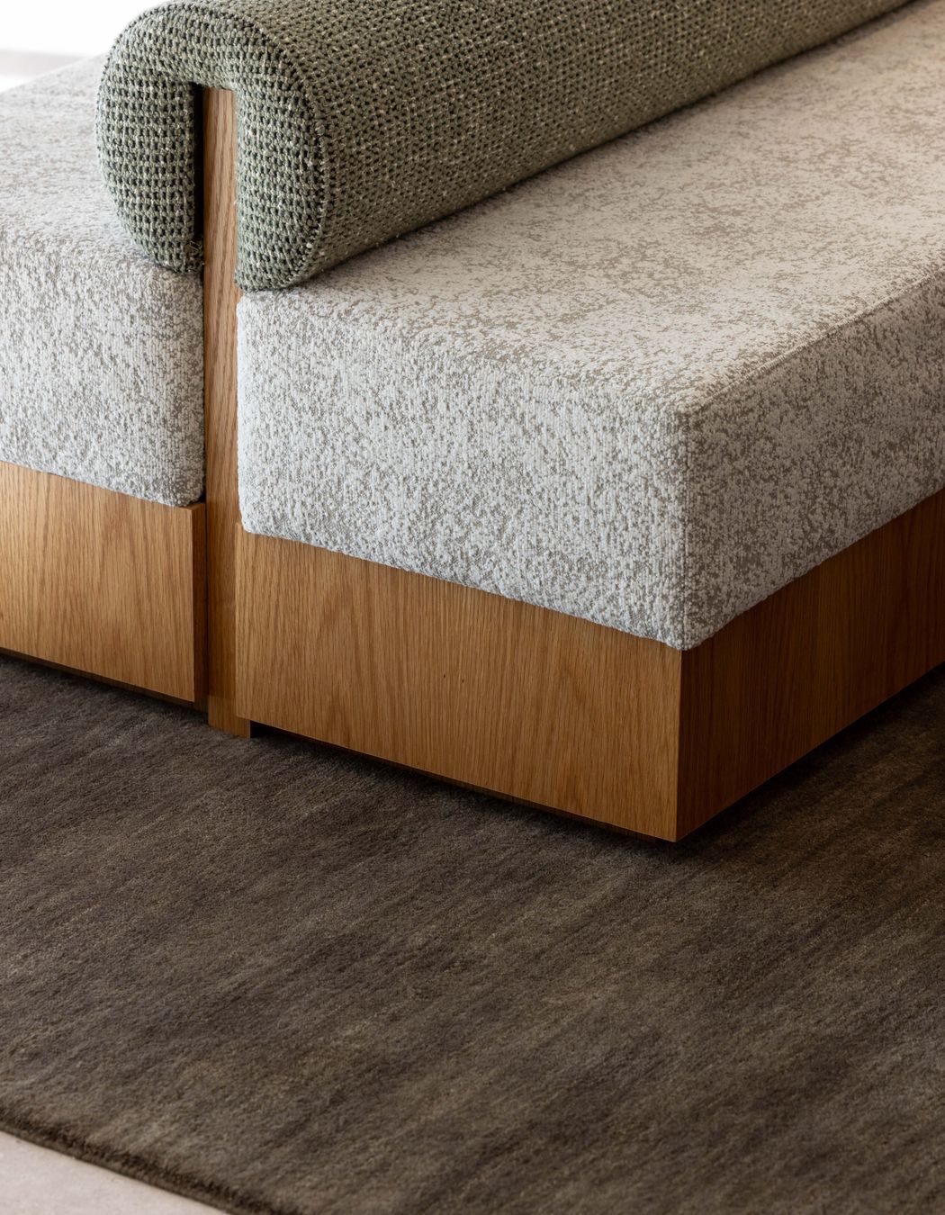 The custom ottoman was made by Evolution Construction &amp; Interiors.