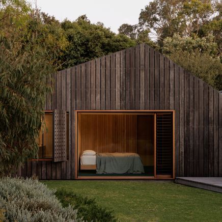 Clad in spotted gum, this rustic addition offers a serene and low-maintenance abode for two