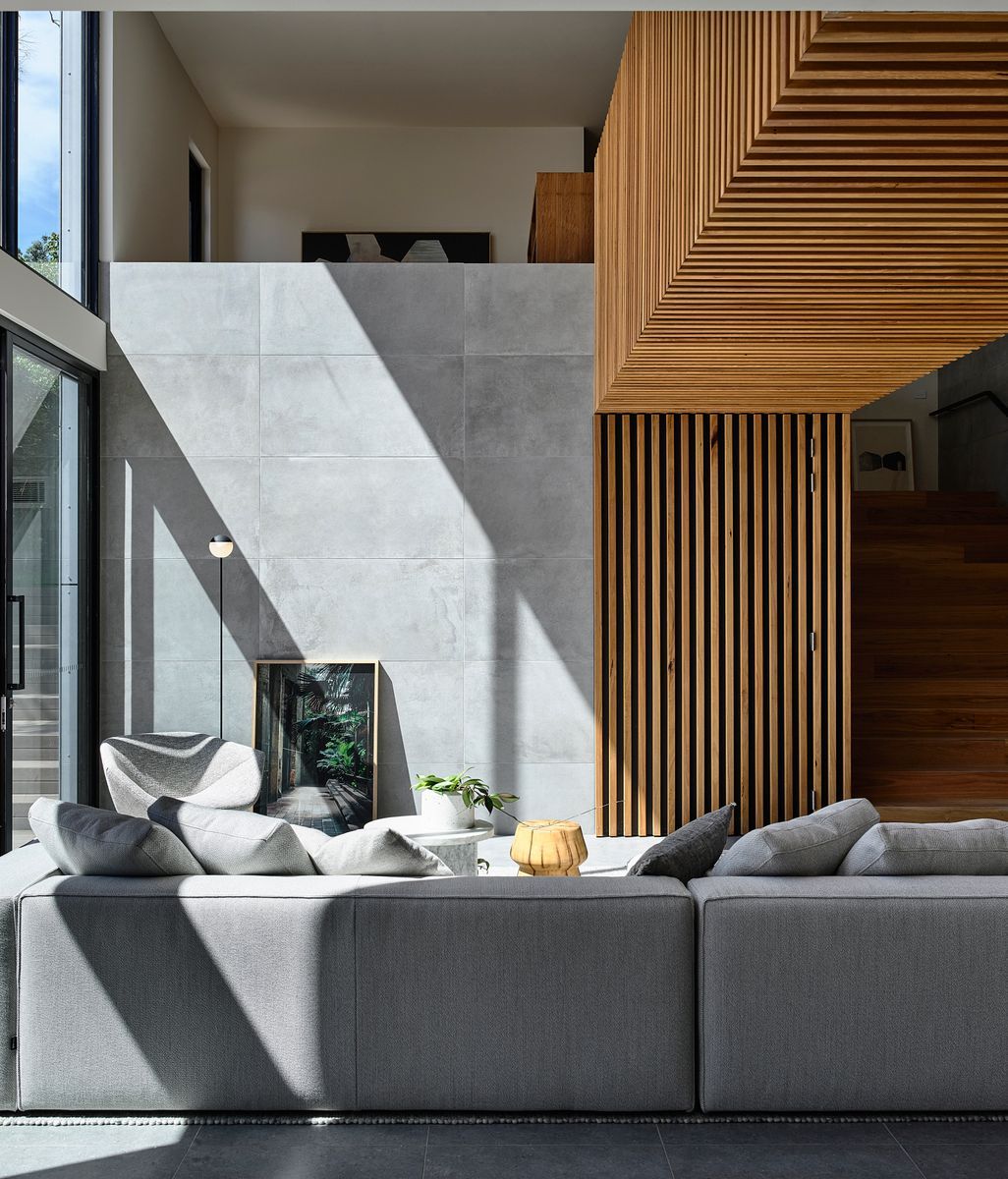 This multi-generational home impresses with its dramatic form